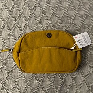 lululemon double zip mini pouch - gold spice